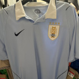 2026/27 Uruguay Home Fans Soccer Jersey (Have Right Patch 有右臂章 金底白字）