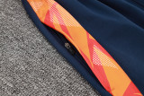 24-25 JUV Orange Half Pull Tracksuit
