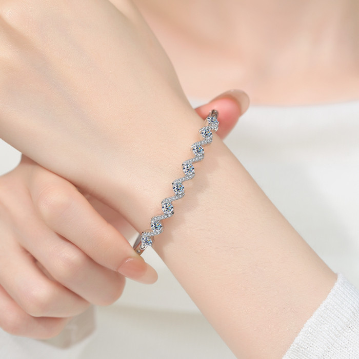 S925 sterling silver wave-shaped moissanite bracelet with a sophisticated design and stylish buckle.