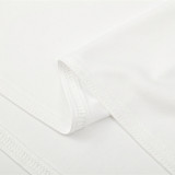 2013/2014 RMA White RetroTraining Shirts