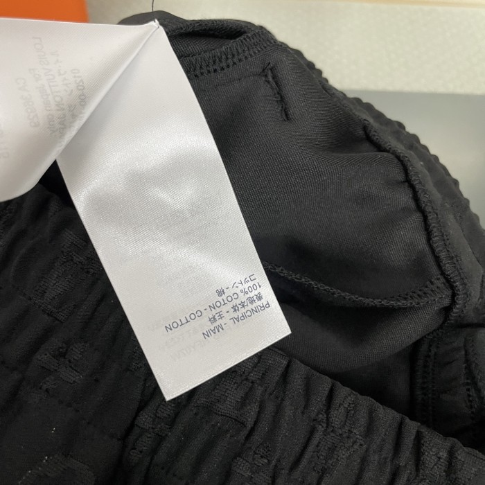 Louis Vuitton Embossed Logo Print Shorts