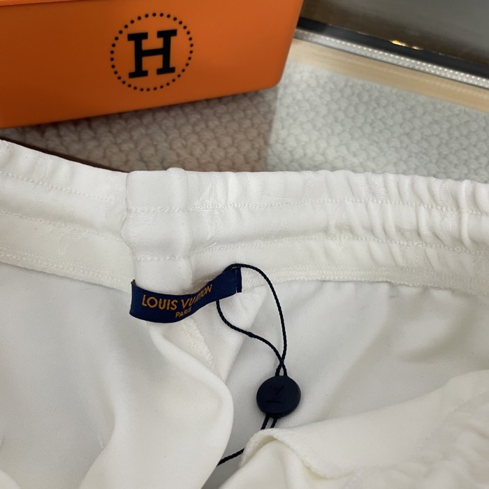 Louis Vuitton Embossed Logo Print Shorts