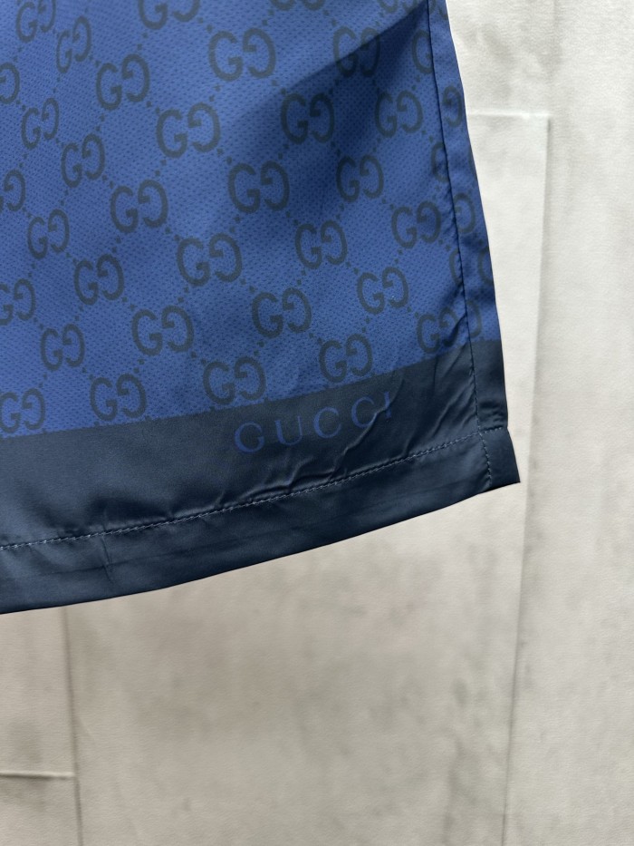 GUCCI Printed technical poplin swim shorts in navy
