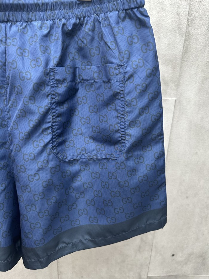 GUCCI Printed technical poplin swim shorts in navy