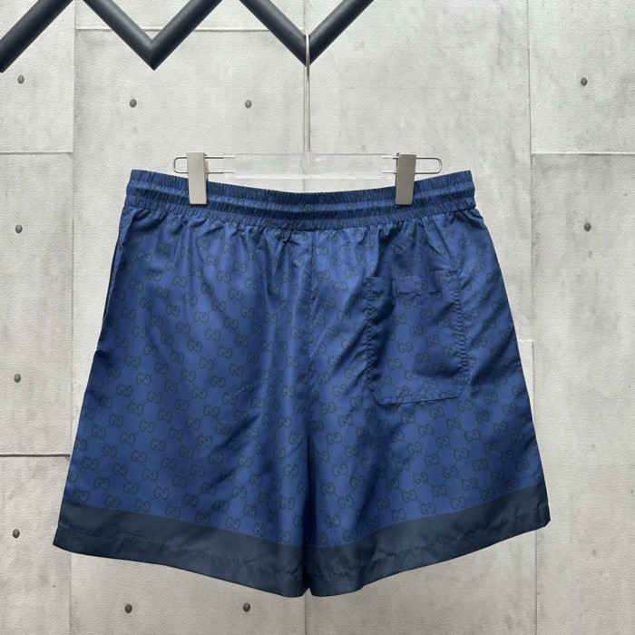 GUCCI Printed technical poplin swim shorts in navy