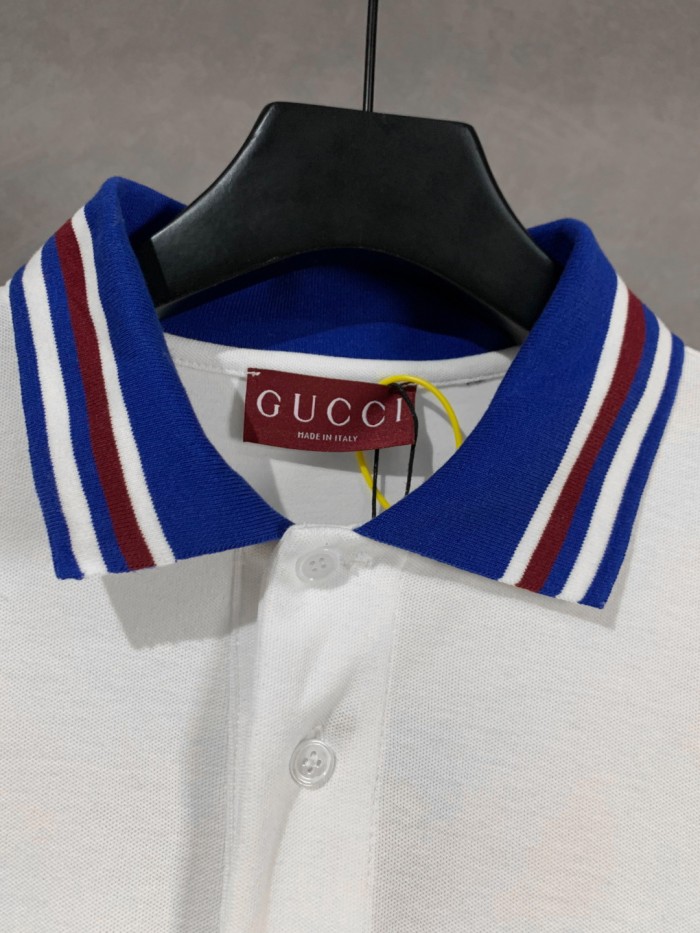 Gucci Cotton piquet polo shirt with intarsia in ivory and blue