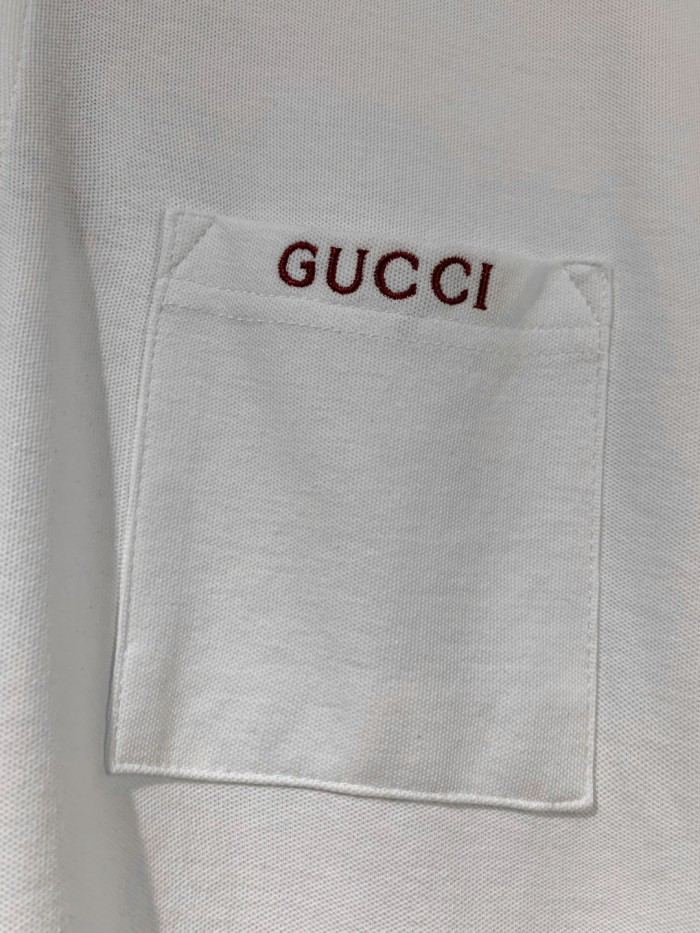 Gucci Cotton piquet polo shirt with intarsia in ivory and blue