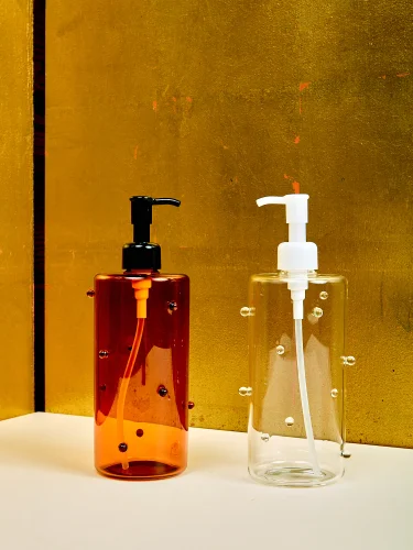 Universal soap bottle