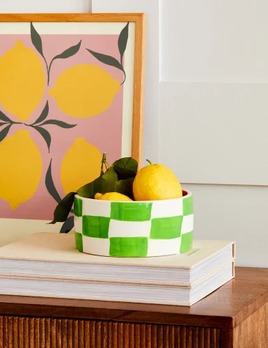 Green and orange checkerboard pattern decorated bowl