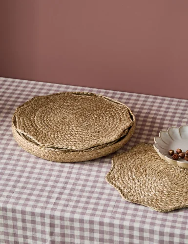 A set of 6 natural fan-shaped placemats