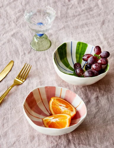 2 bowls with white and pink abstract shapes