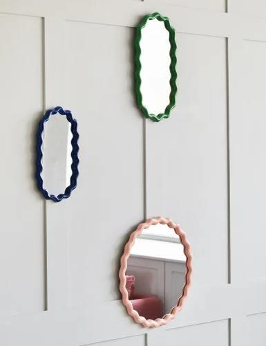 Small oval blue wave mirror