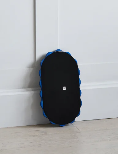 Small oval blue wave mirror