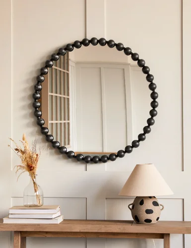 Round black spherical mirror