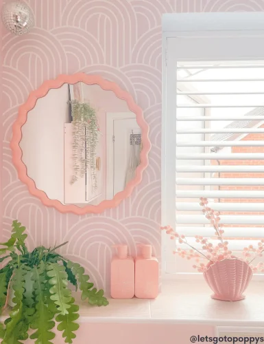 Circular pink wave mirror