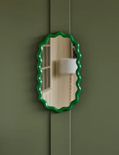 Medium oval green wavy mirror
