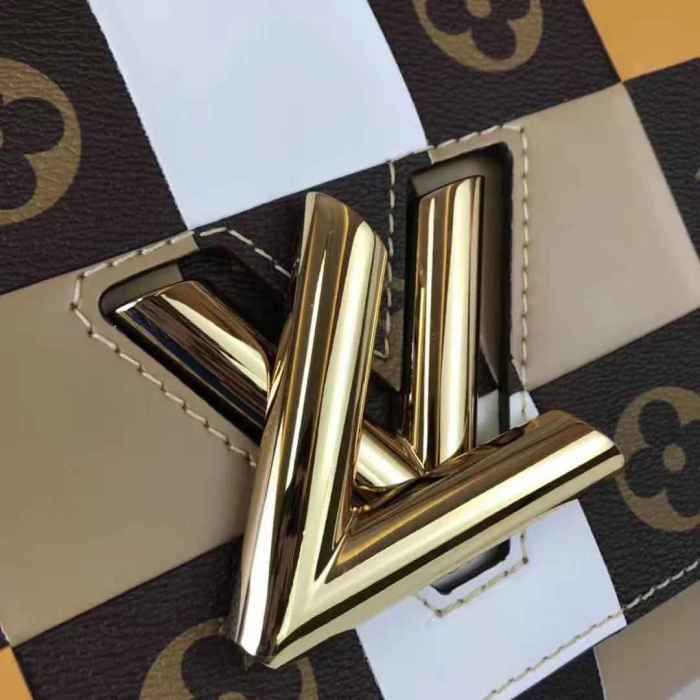 Louis Vuitton LV Women Twist MM Handbag in Smooth Cowhide and Monogram Coated Canvas
