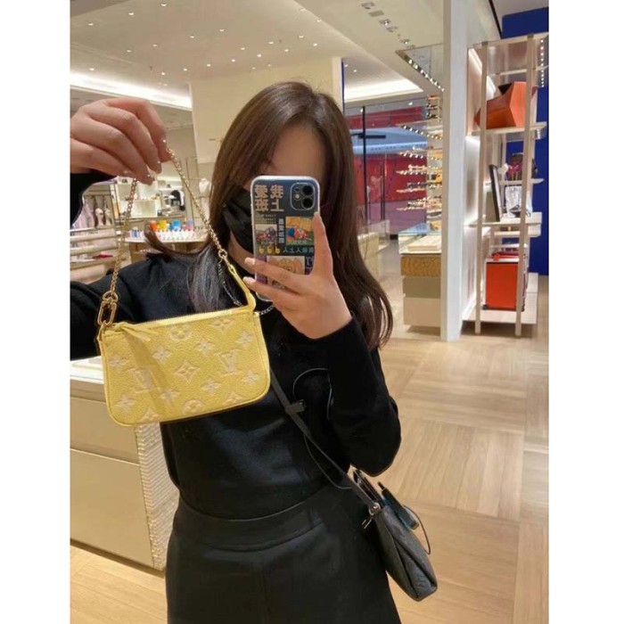Louis Vuitton LV Women Mini Pochette Accessoires Yellow Monogram Empreinte Embossed Supple Grained Cowhide