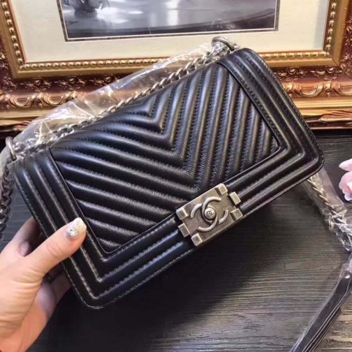 Chanel Boy Chanel Handbag in Chevron Quilted Calfskin Leather-Black