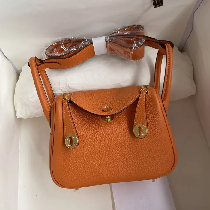 Hermes Women Lindy Mini 19 in Clemence Leather-Orange/Gold