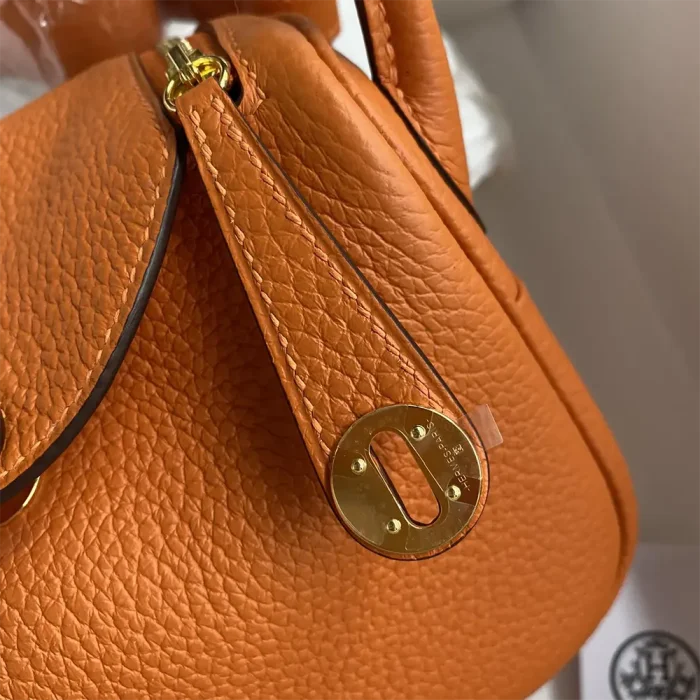 Hermes Women Lindy Mini 19 in Clemence Leather-Orange/Gold