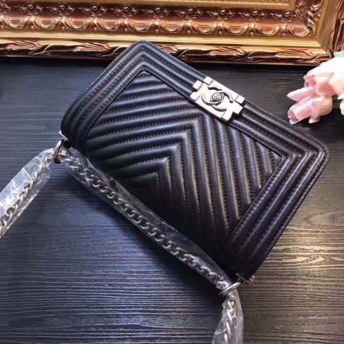 Chanel Boy Chanel Handbag in Chevron Quilted Calfskin Leather-Black