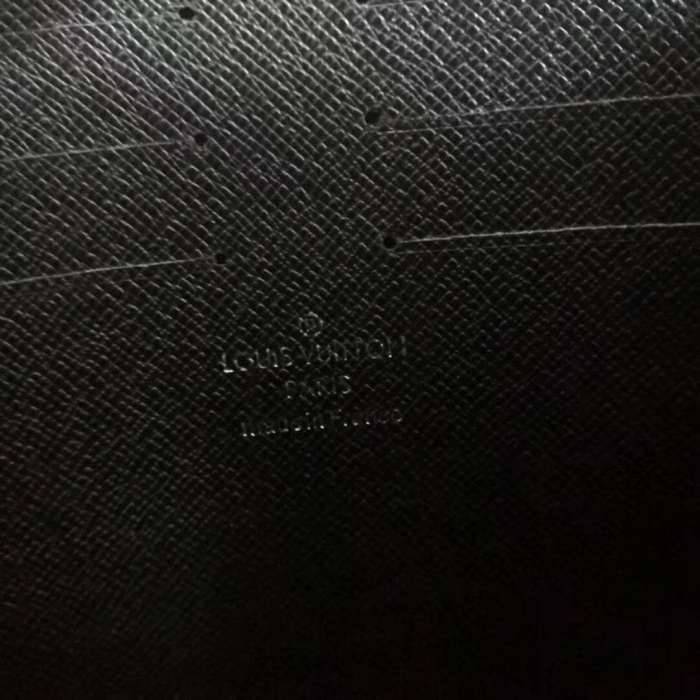 Louis Vuitton LV Men Pochette Voyage in Deep-Dyed Taiga Leather