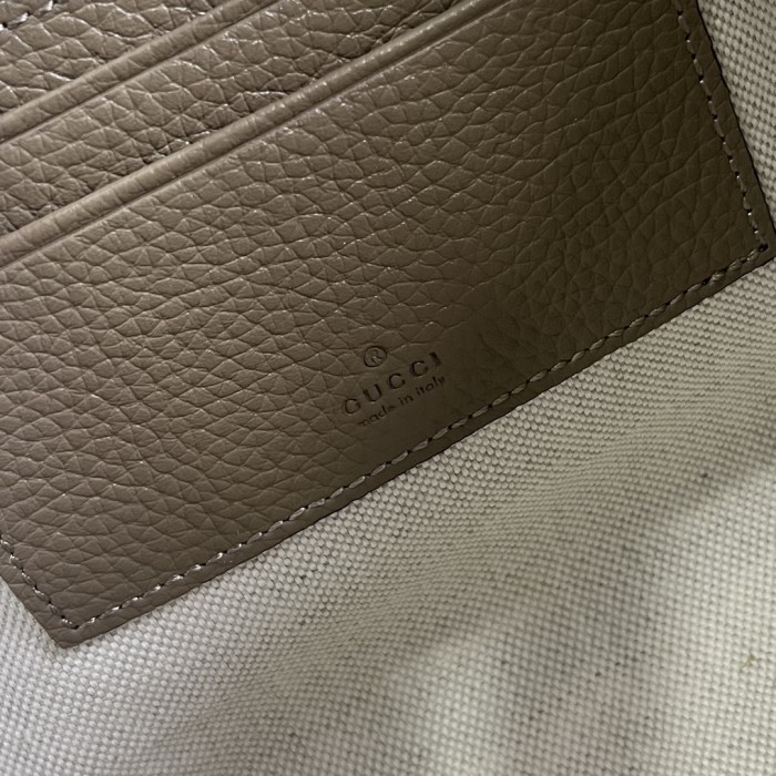 Gucci Unisex Jumbo GG Pouch Taupe Jumbo GG Leather Moiré Lining