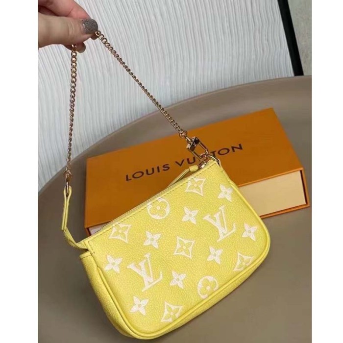 Louis Vuitton LV Women Mini Pochette Accessoires Yellow Monogram Empreinte Embossed Supple Grained Cowhide