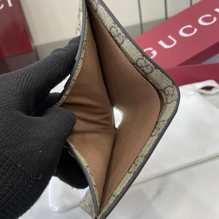 Gucci Unisex GG Emblem Bi Fold Embossed Wallet-Brown