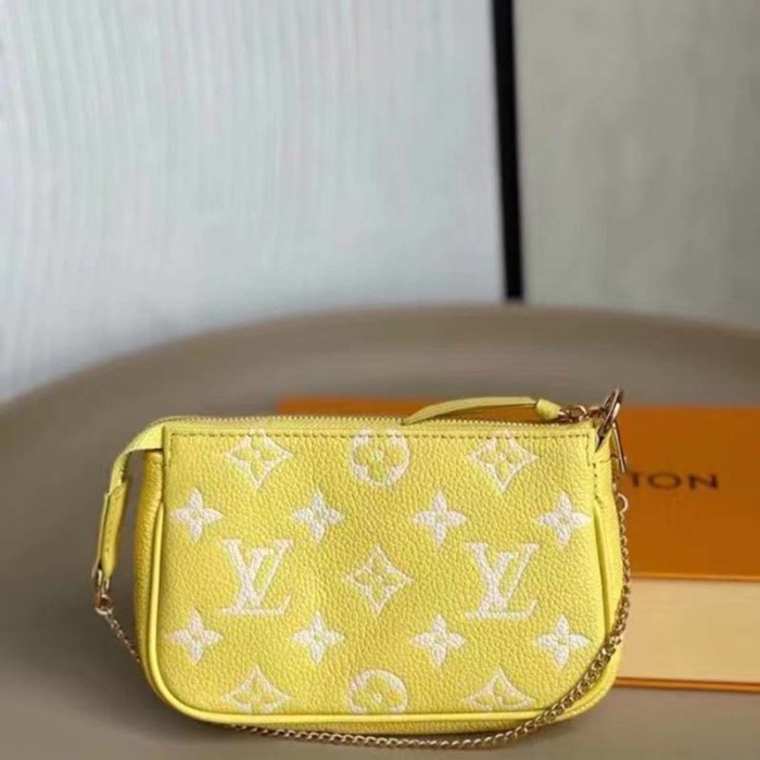 Louis Vuitton LV Women Mini Pochette Accessoires Yellow Monogram Empreinte Embossed Supple Grained Cowhide