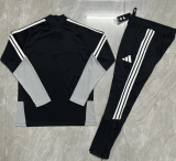 26-27 Celtic High Quality Half Pull Tracksuit