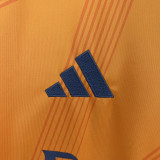 2024-25 Real Madrid away orange soccer jersey