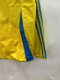 2025-26 Real Madrid  yellow and blue reversible windbreaker