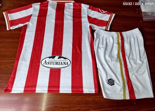 26/27 Gijon home Kids kit jerseys.