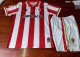 26/27 Gijon home Kids kit jerseys.
