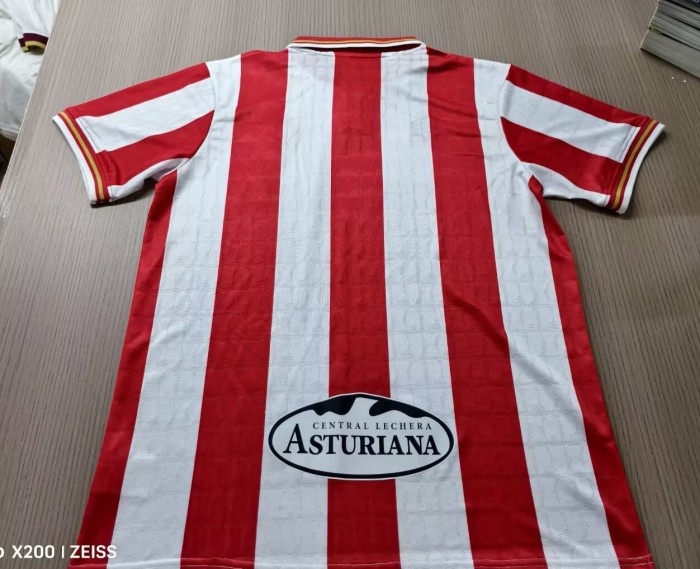 26/27 Gijon home jerseys.