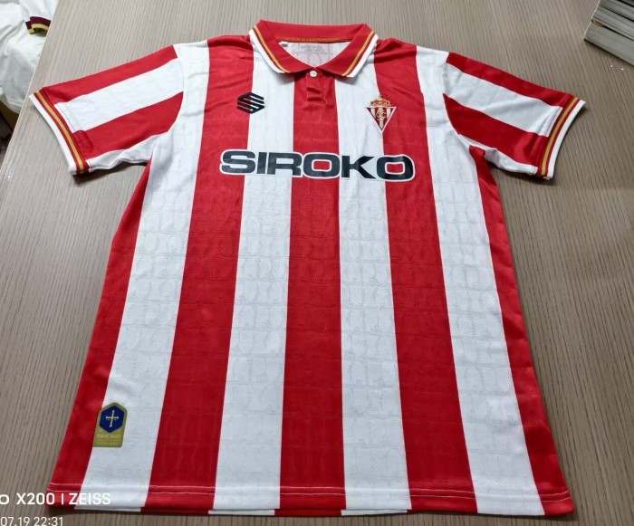 26/27 Gijon home jerseys.