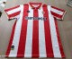 26/27 Gijon home jerseys.