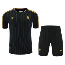 2025-26 Manchester United black training jersey and shorts kit