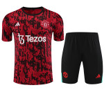 Manchester United 2024/25 Pre-Match Training Kit - Red Abstract Camo with Black & Green Accents