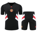 Manchester United 2024/25 Pre-Match Training Kit - Black Pinstripe with Red & White Geometric Accents