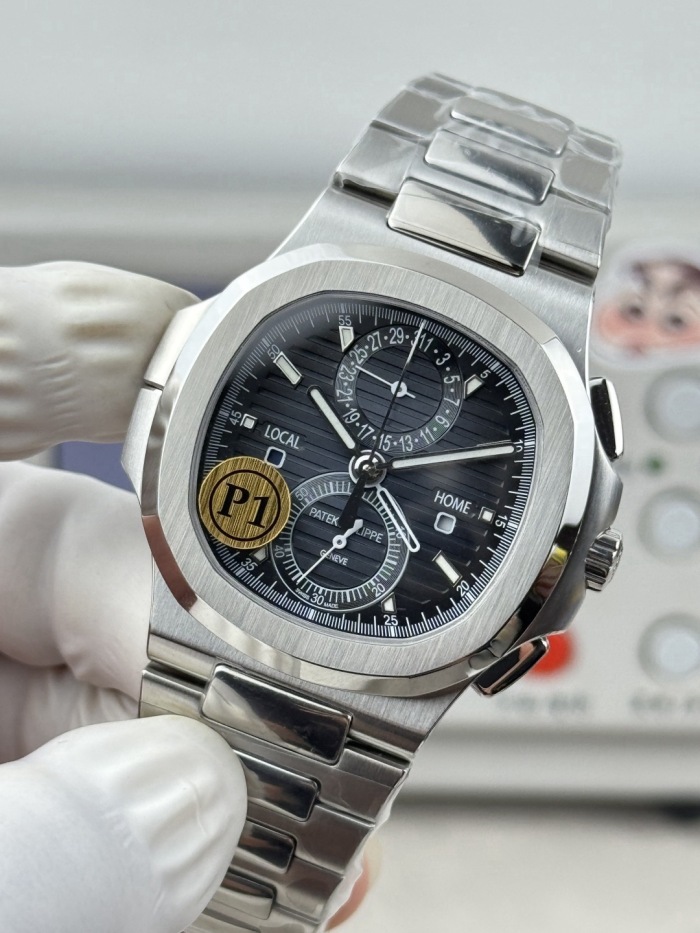 Patek Philippe Nautilus Travel Time Chronograph Stainless Steel ref 5990/1A‑001 40.5mm