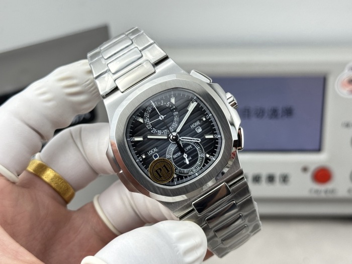 Patek Philippe Nautilus Travel Time Chronograph Stainless Steel ref 5990/1A‑001 40.5mm
