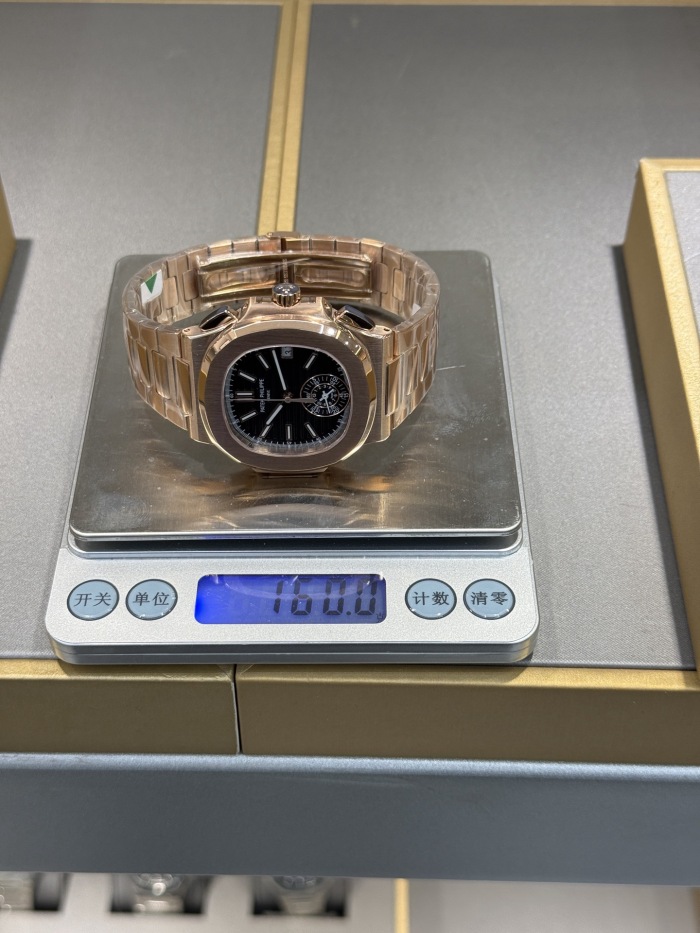 Patek Philippe Nautilus ref 5980/1R‑001 40.5mm Rose Gold