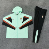 26/27 France Light Green Hooded Windbreaker Tracksuit