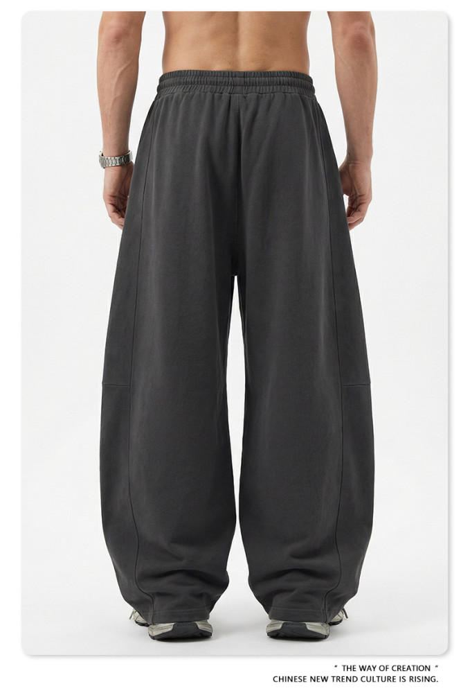 New American retro loose plus size washed curved blade pants with patchwork straight leg and drawstring wide-leg design for men.
