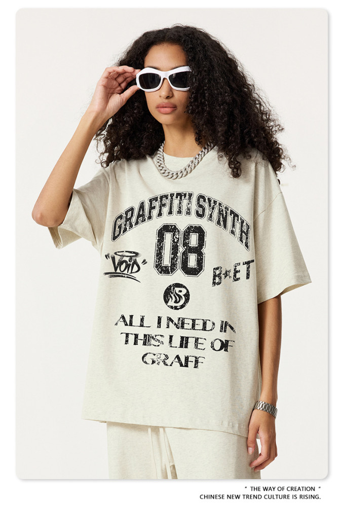 Graffiti-style preppy short-sleeved distressed washed loose drop-shoulder t-shirt, unisex.