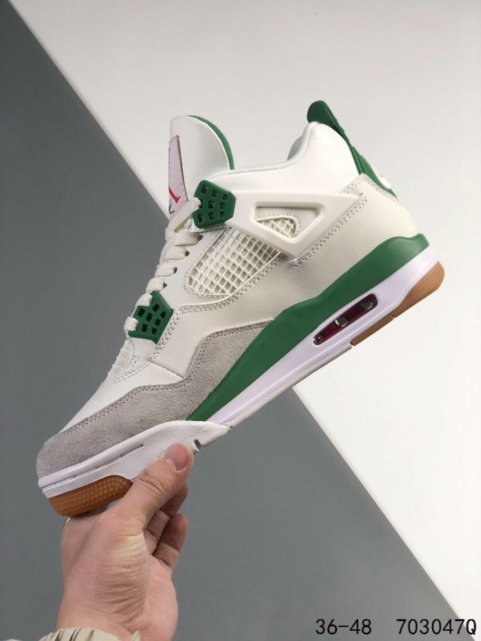 Generation 4 White and Green Basketball Shoes