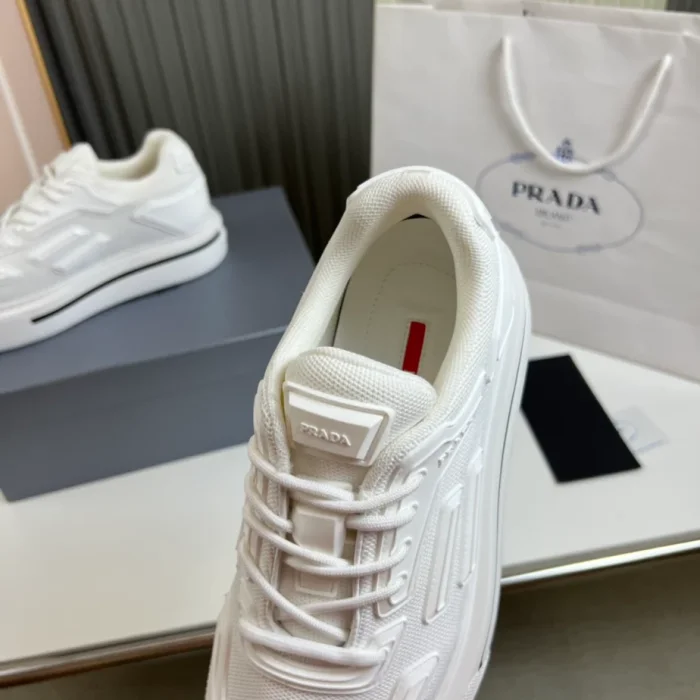 PR@DA@ MACRO RE-NYLON AND BRUSHED LEATHER SNEAKERS   PRD061